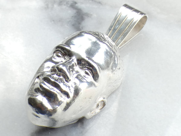 Face Pendant